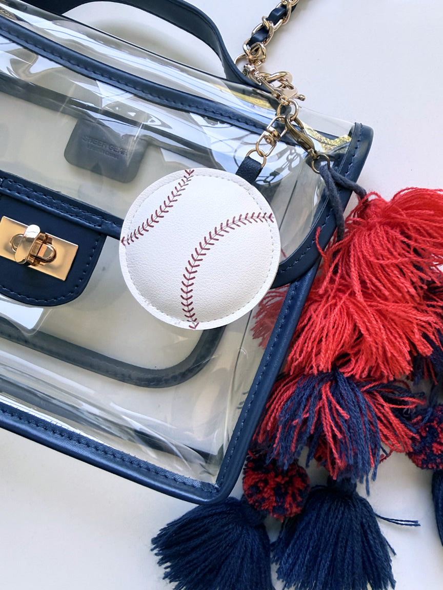 Baseball Charm Purse Accessory hanging from a Sheergear Stadium Approved Handbag