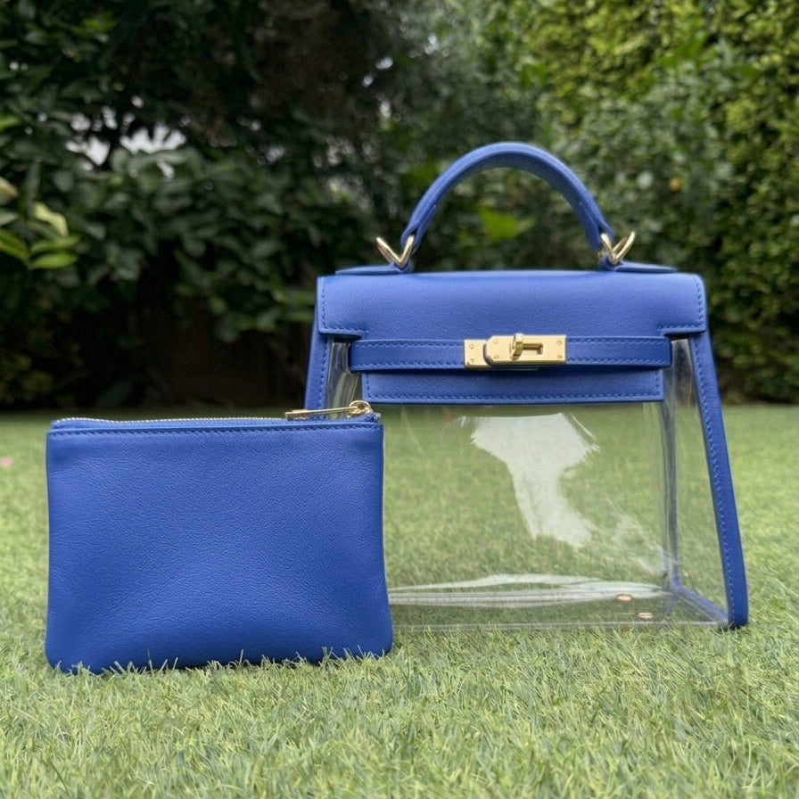 A royal blue stadium approved fashion handbag with see through vinyl sides.