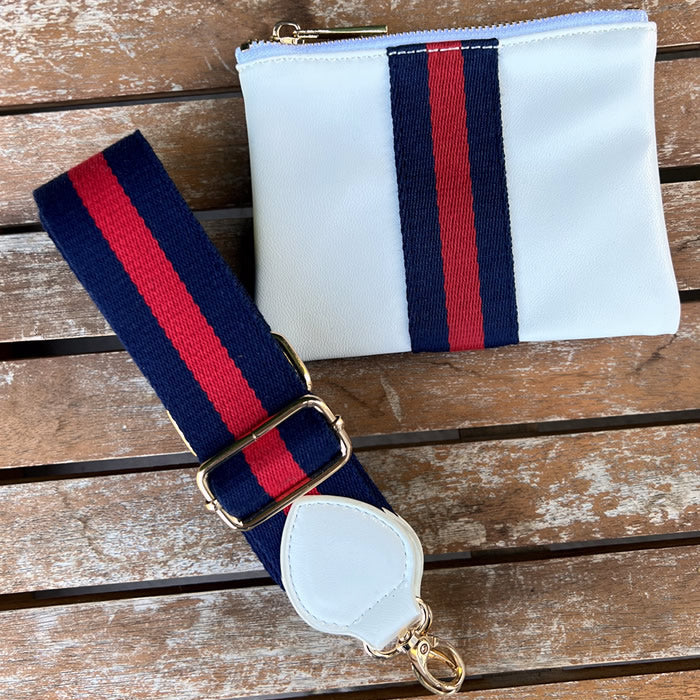 Faux-leather white accessories pouch with matching navy and red striped purse strap