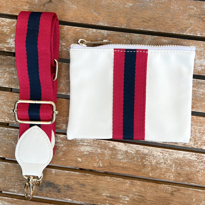 Faux-leather white accessories pouch with matching red and navy striped purse strap