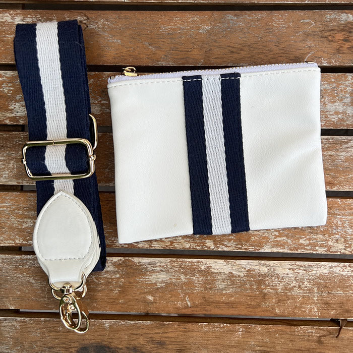 Faux-leather white accessories pouch with matching white and navy striped purse strap