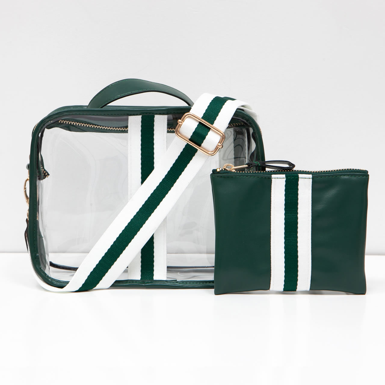 Green and white striped clear stadium handbag with matching pouch on a white background